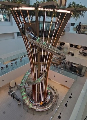 This district office offers more than paperwork. It has giant slides